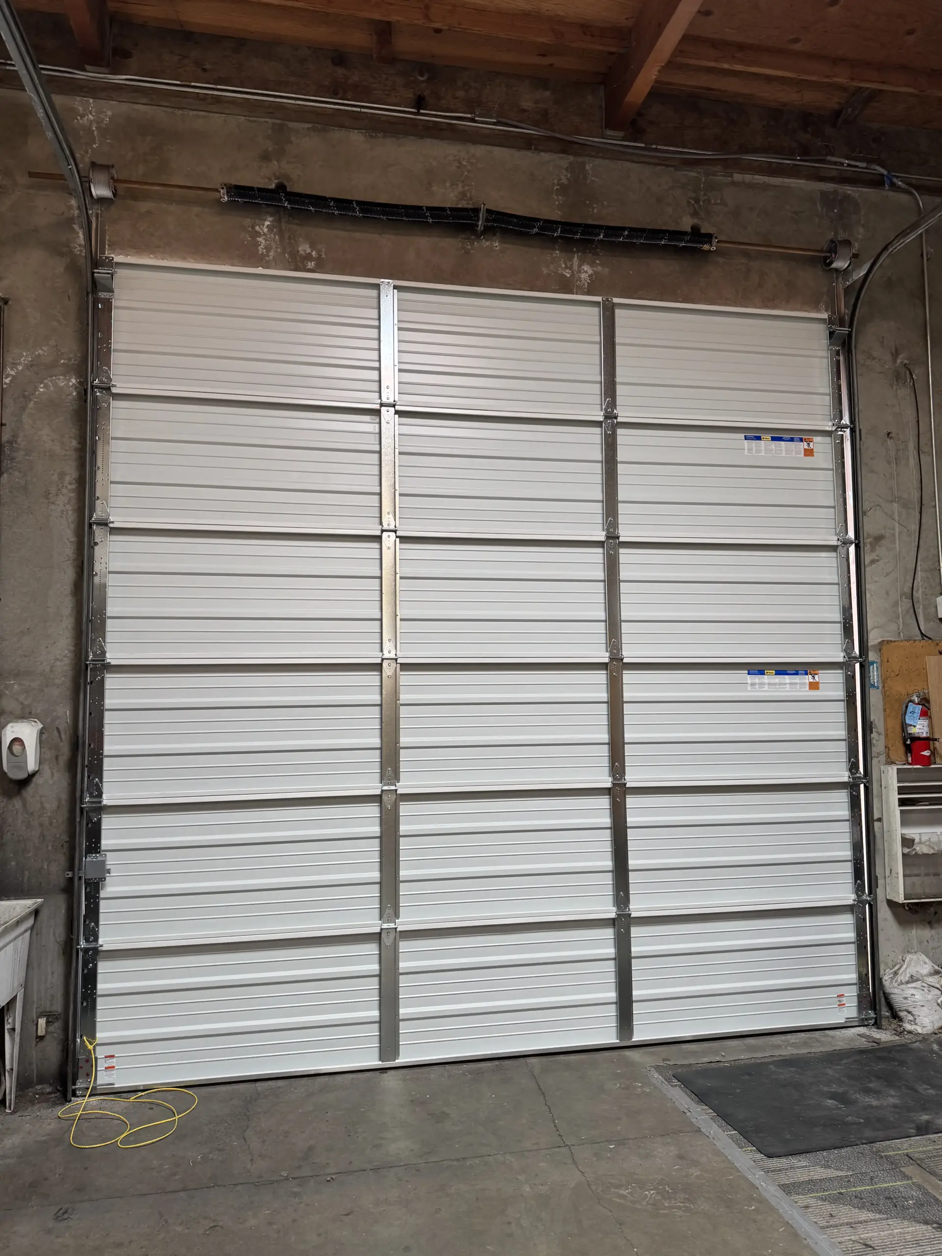 Keep your business secure with Level 10 Overhead Door commercial garage door services.